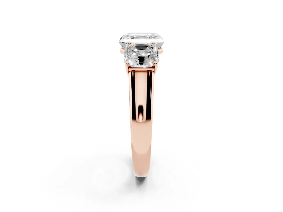 Asscher Cut Three-Stone Diamond Ring with Prong Setting on a Classic Band Rose gold