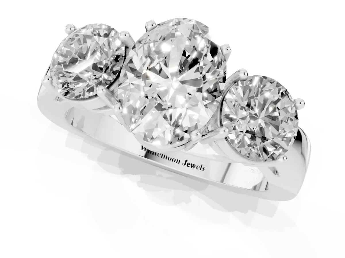 Three-Stone Oval Cut Diamond Ring with Round Side Stones, Classic Band, and Four-Prong Setting Silver