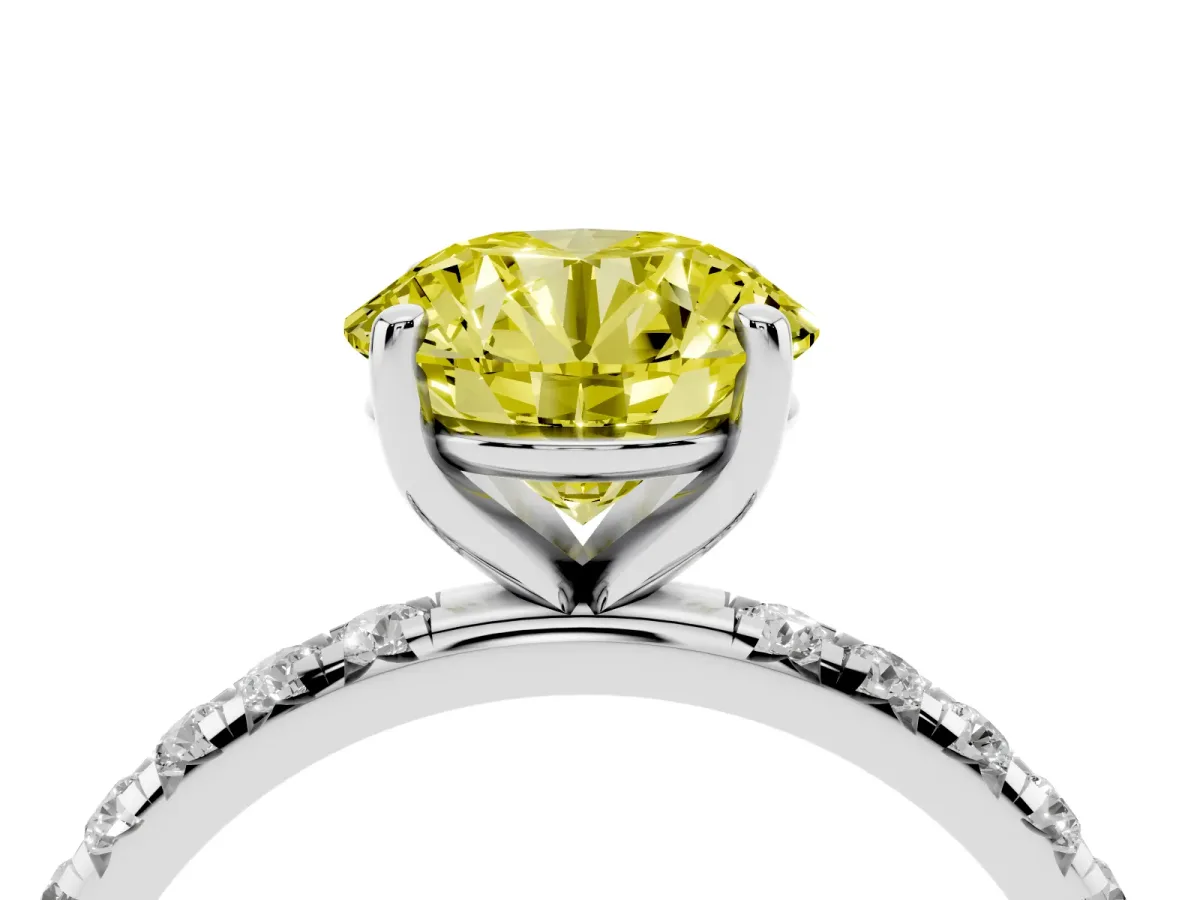 Fancy Yellow Round Cut Cut Diamond Solitaire Ring with Micro Pave Band and Four Prong Setting Platinum