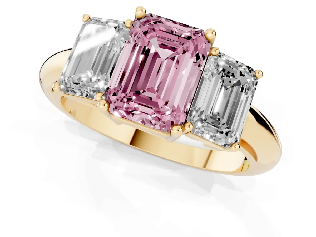 Fancy Pink Three-Stone Emerald Cut Cut Diamond Engagement Ring with Prong Setting on a White Gold Band Yellow gold