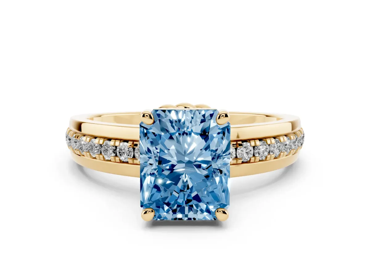 Fancy Blue Radiant Cut Solitaire Diamond Ring with Channel Set Band and Six-Prong Setting Yellow gold
