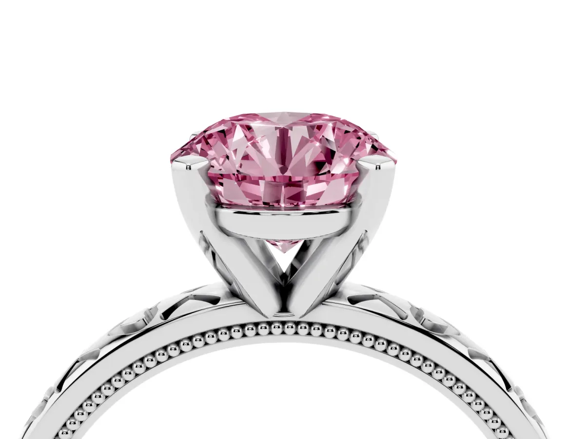 Fancy Pink Round Cut Solitaire Diamond Engagement Ring with XO Engraved Band and Four-Prong Setting Silver
