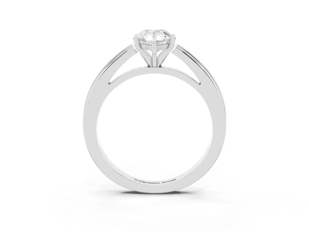 Pear Cut Solitaire Diamond Ring with Four-Prong Setting and Classic Band Platinum