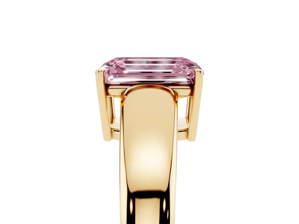 Fancy Pink Emerald Cut Solitaire Diamond Ring with Tapered Band and Four-Prong Setting Yellow gold