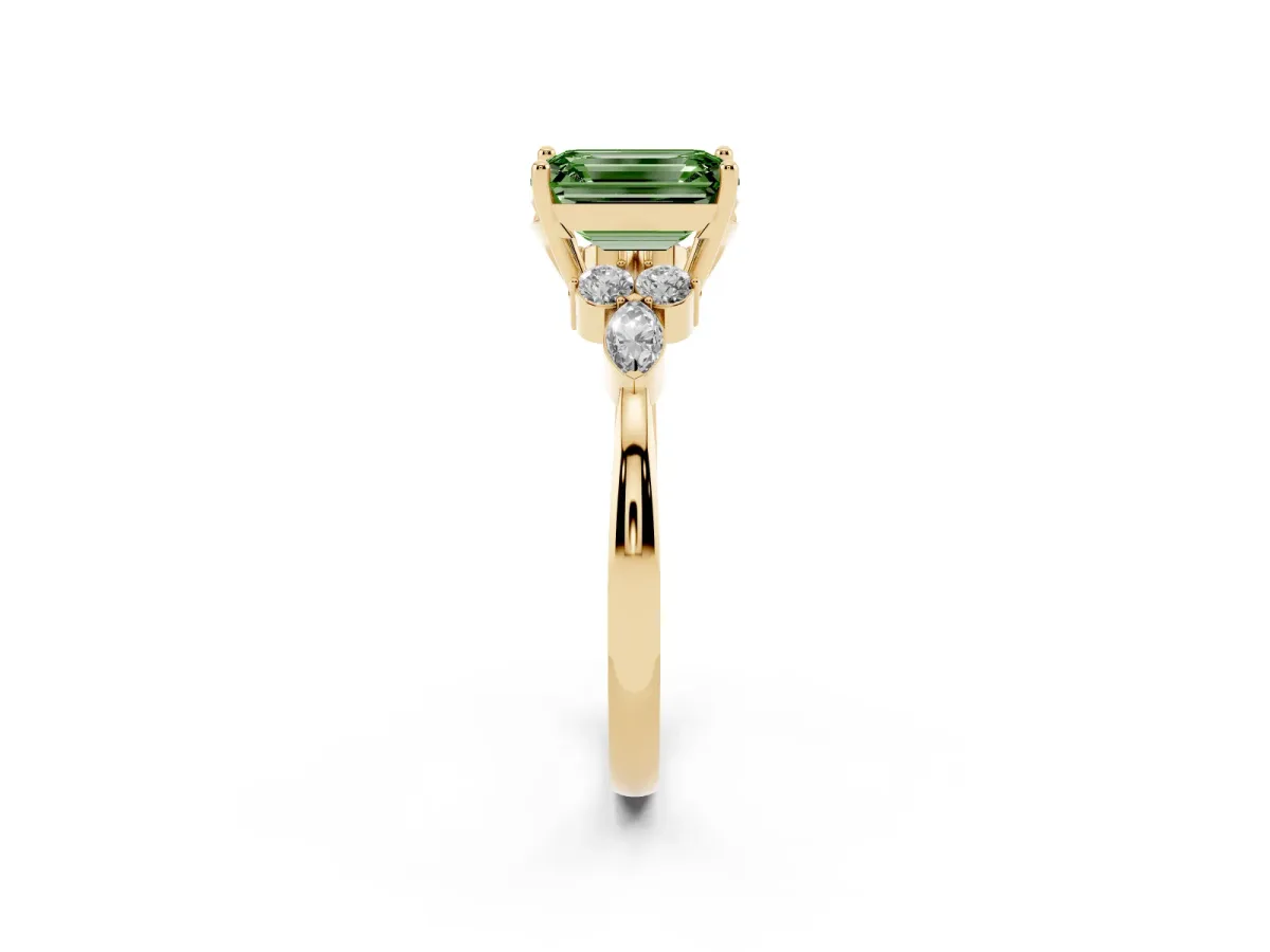 Fancy Green Emerald Cut Brilliant Diamond Solitaire Ring with Pear Side Stones and Four-Prong Setting Yellow gold