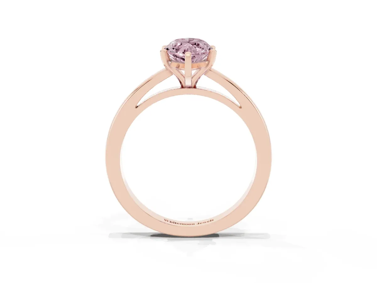 Fancy Pink Marquise Cut Solitaire Diamond Engagement Ring with Four-Prong Setting on a Classic Band Rose gold