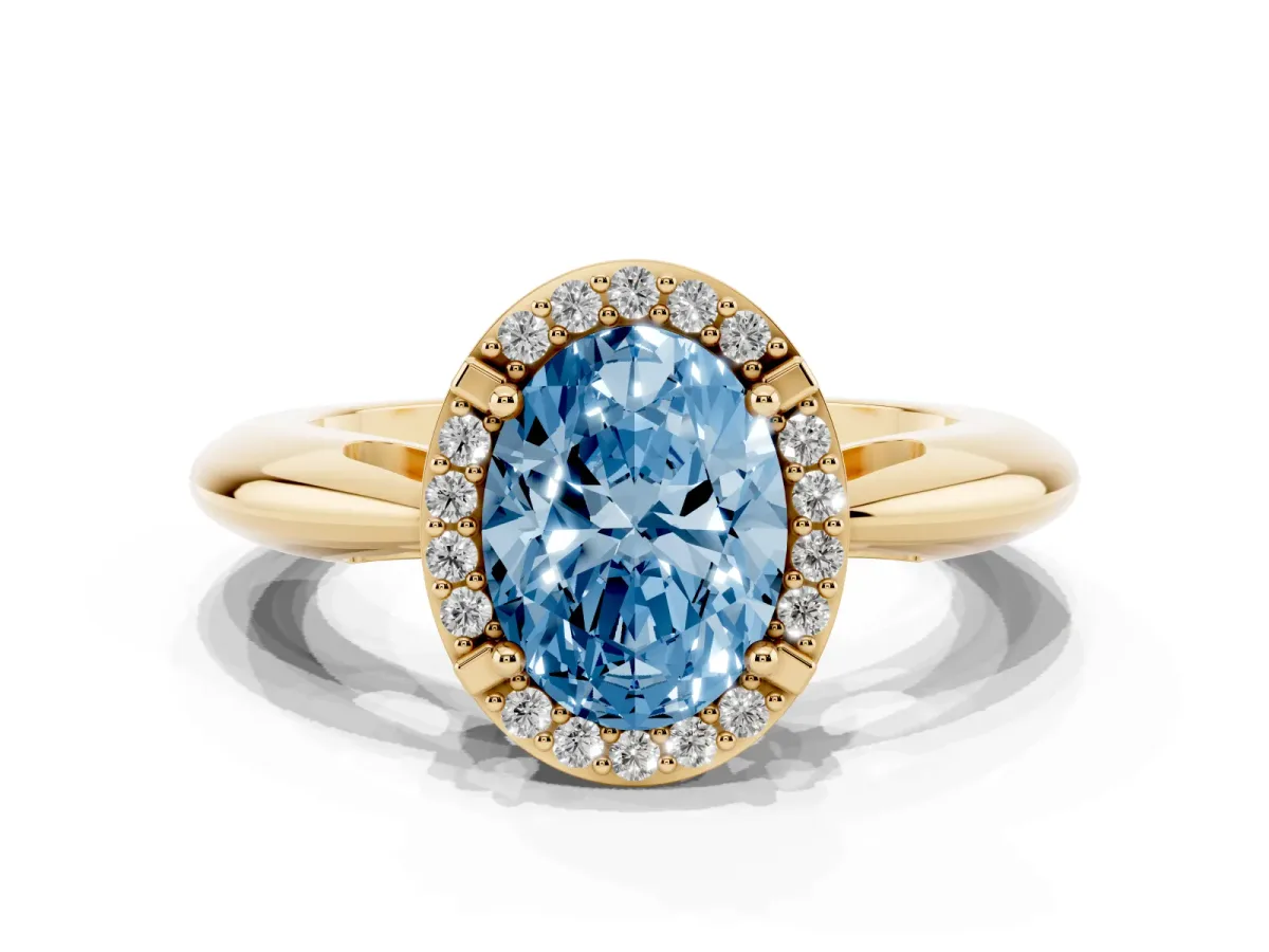 Fancy Blue Oval Cut Cut Diamond Halo Engagement Ring with Split Shank and Four-Prong Setting Yellow gold