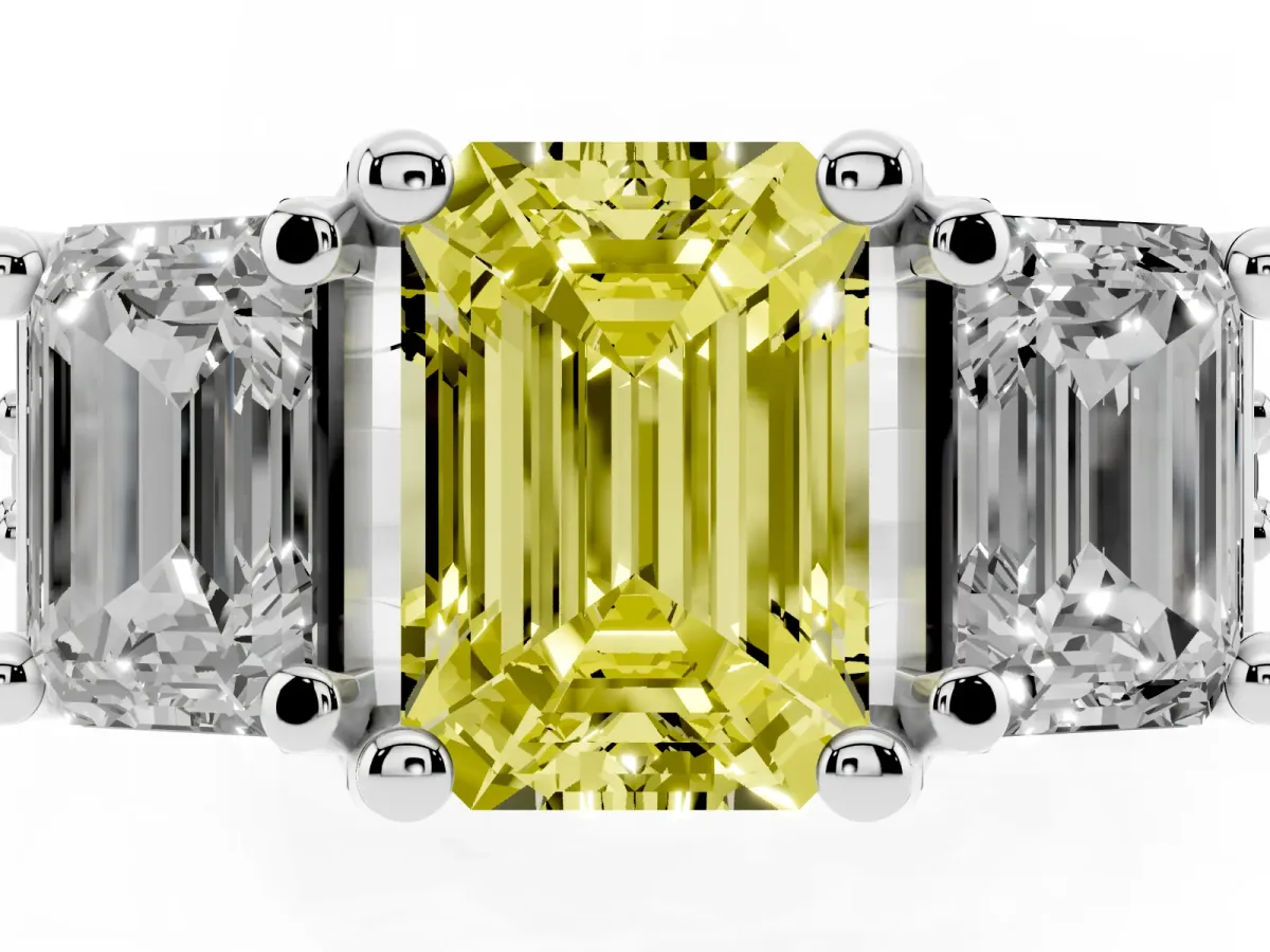 Fancy Yellow Emerald Cut Diamond Three-Stone Ring with Channel Set Band and Four-Prong Setting Platinum