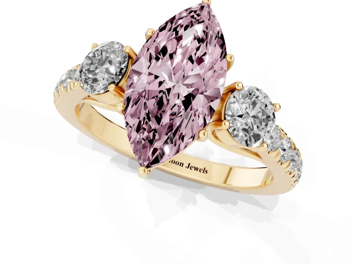 Fancy Pink Marquise Cut Cut Diamond Three-Stone Ring with Round Side Stones and Pavé Band Yellow gold