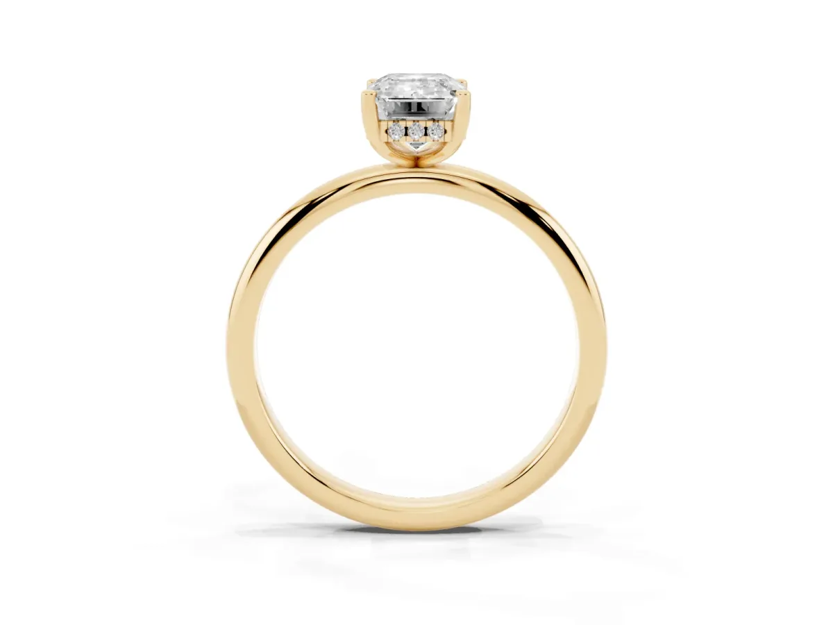 Emerald Cut Cut Solitaire Engagement Ring with Four-Prong Setting and Classic Band Yellow gold