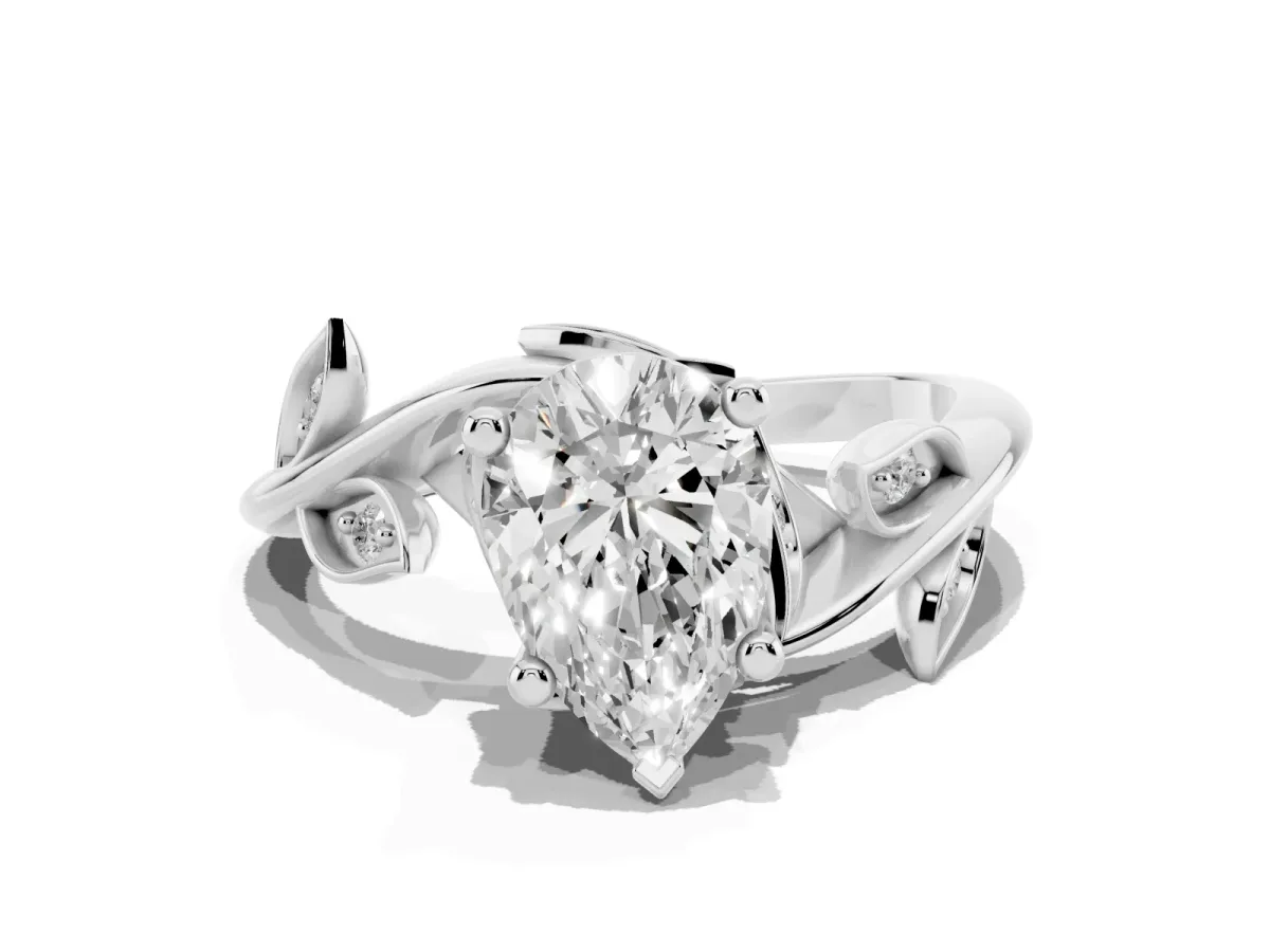 Pear Cut Solitaire Twist Engagement Ring with Leaf Accents and Prong Setting Silver