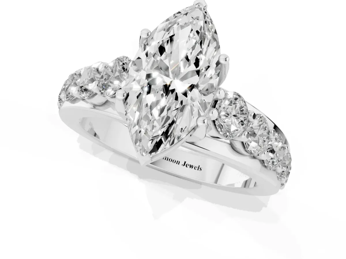 Marquise Cut Diamond Engagement Ring with Pavé Band and Four-Prong Setting Silver