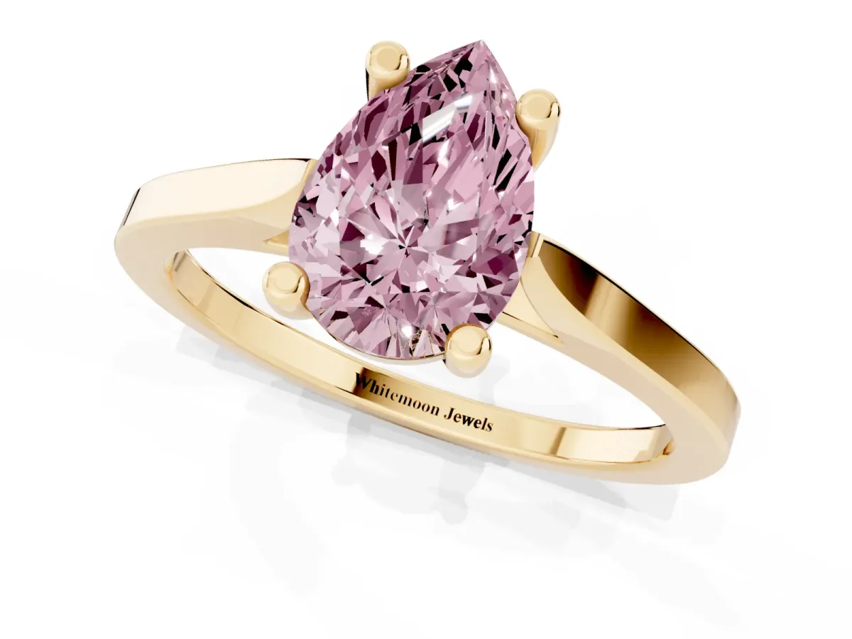 Fancy Pink Pear Cut Solitaire Diamond Ring with Four-Prong Setting and Tapered Band Yellow gold