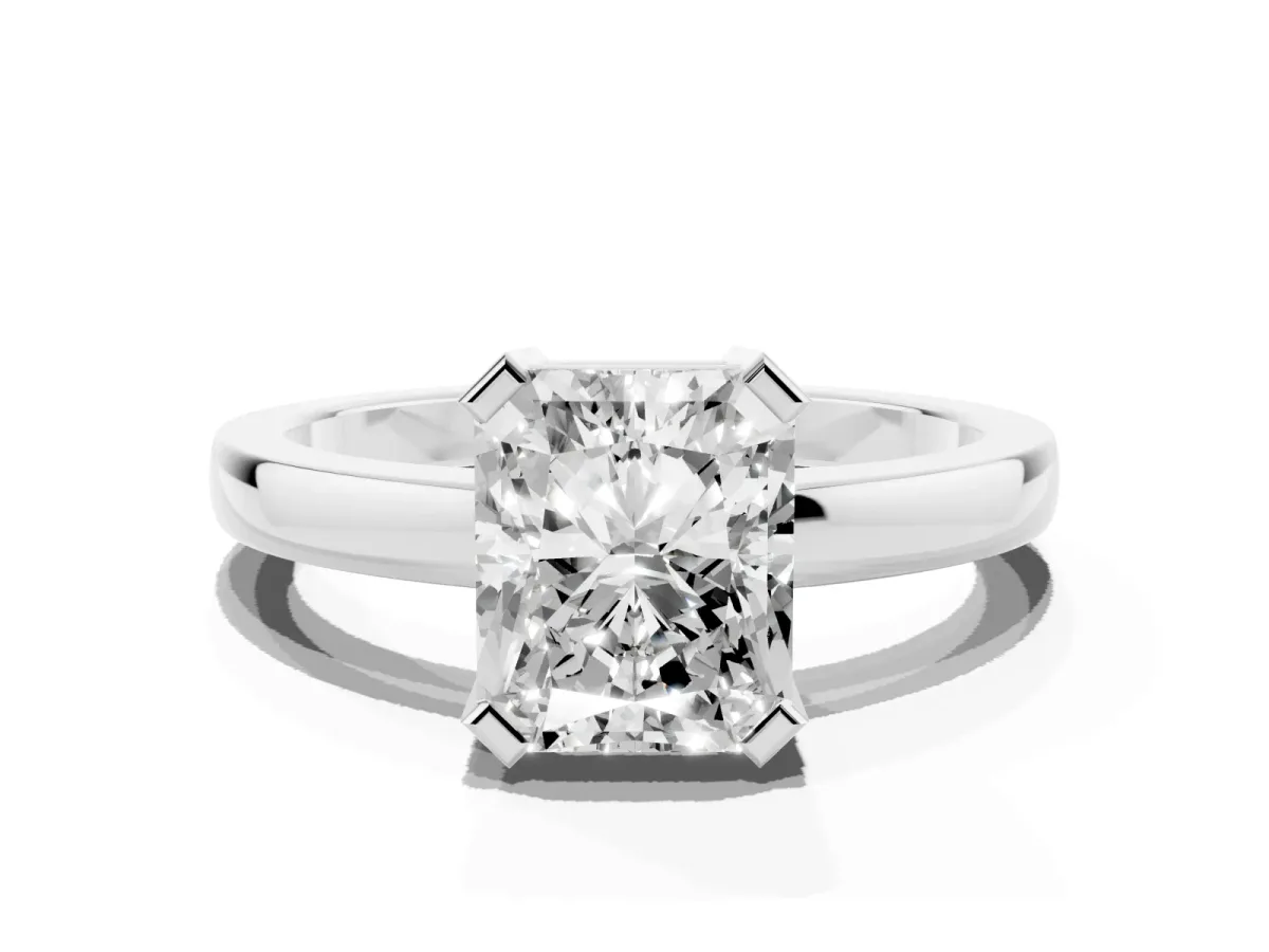 Radiant Cut Cut Solitaire Ring with Four-Prong Setting and Classic Band Silver