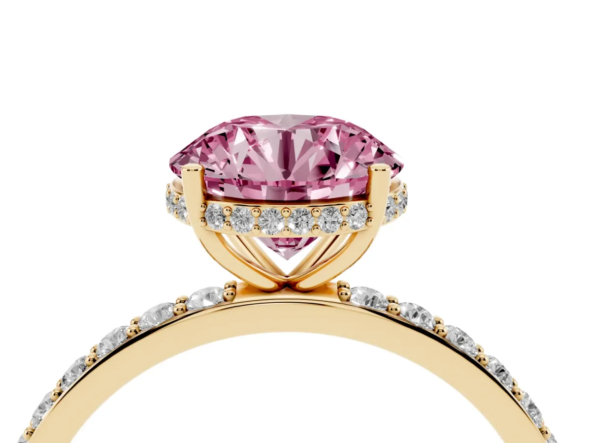 Fancy Pink Round Cut Diamond Solitaire Ring with Pavé Band and Hidden Halo Yellow gold