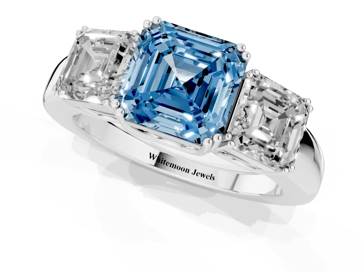 Fancy Blue Three-Stone Asscher Cut Cut Diamond Ring with Channel Set Band and Four-Prong Setting Silver