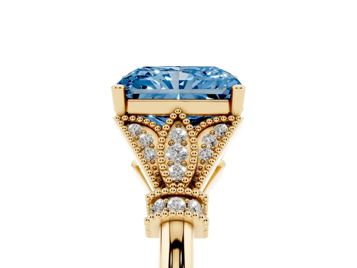 Fancy Blue Radiant Cut Diamond Solitaire Ring with Floral Filigree and Pave Accents Yellow gold
