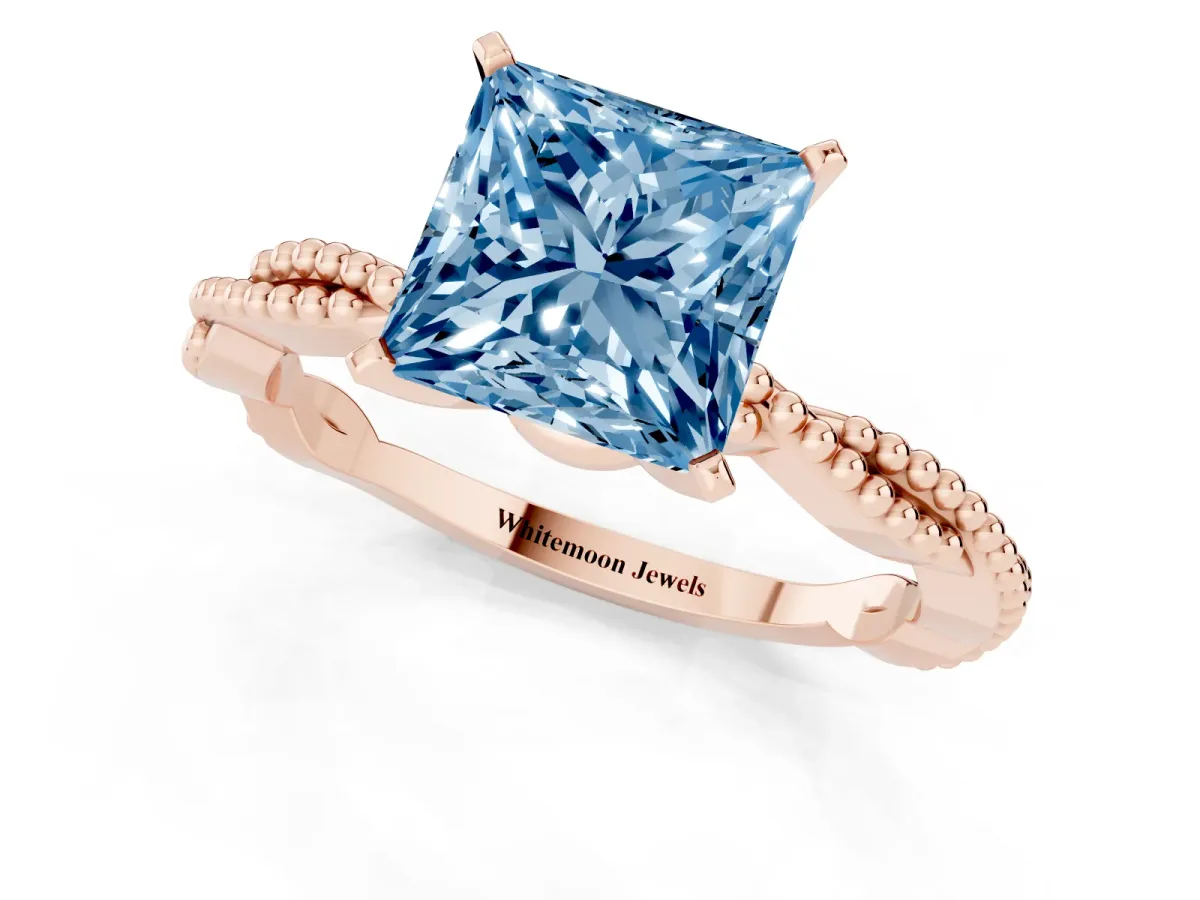 Fancy Blue Princess Cut Solitaire Twisted Band with Bead Prong Setting Rose gold