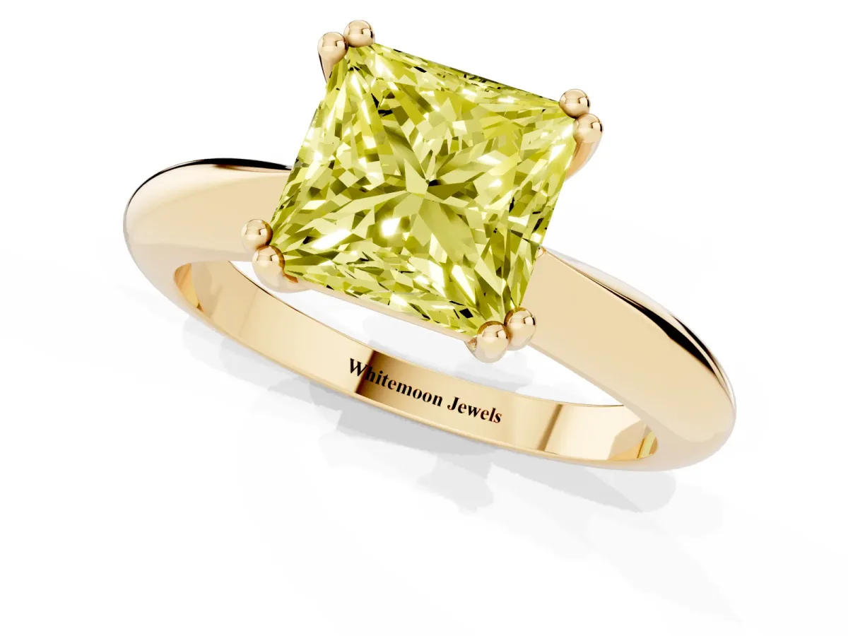 Fancy Yellow Princess Cut Cut Solitaire Engagement Ring with Tapered Band and Four-Prong Setting Yellow gold
