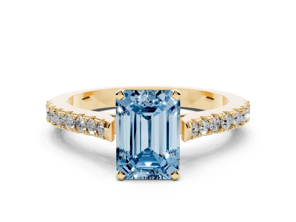 Fancy Blue Emerald Cut Cut Solitaire Diamond Engagement Ring with Pave Band and Four-Prong Setting Yellow gold