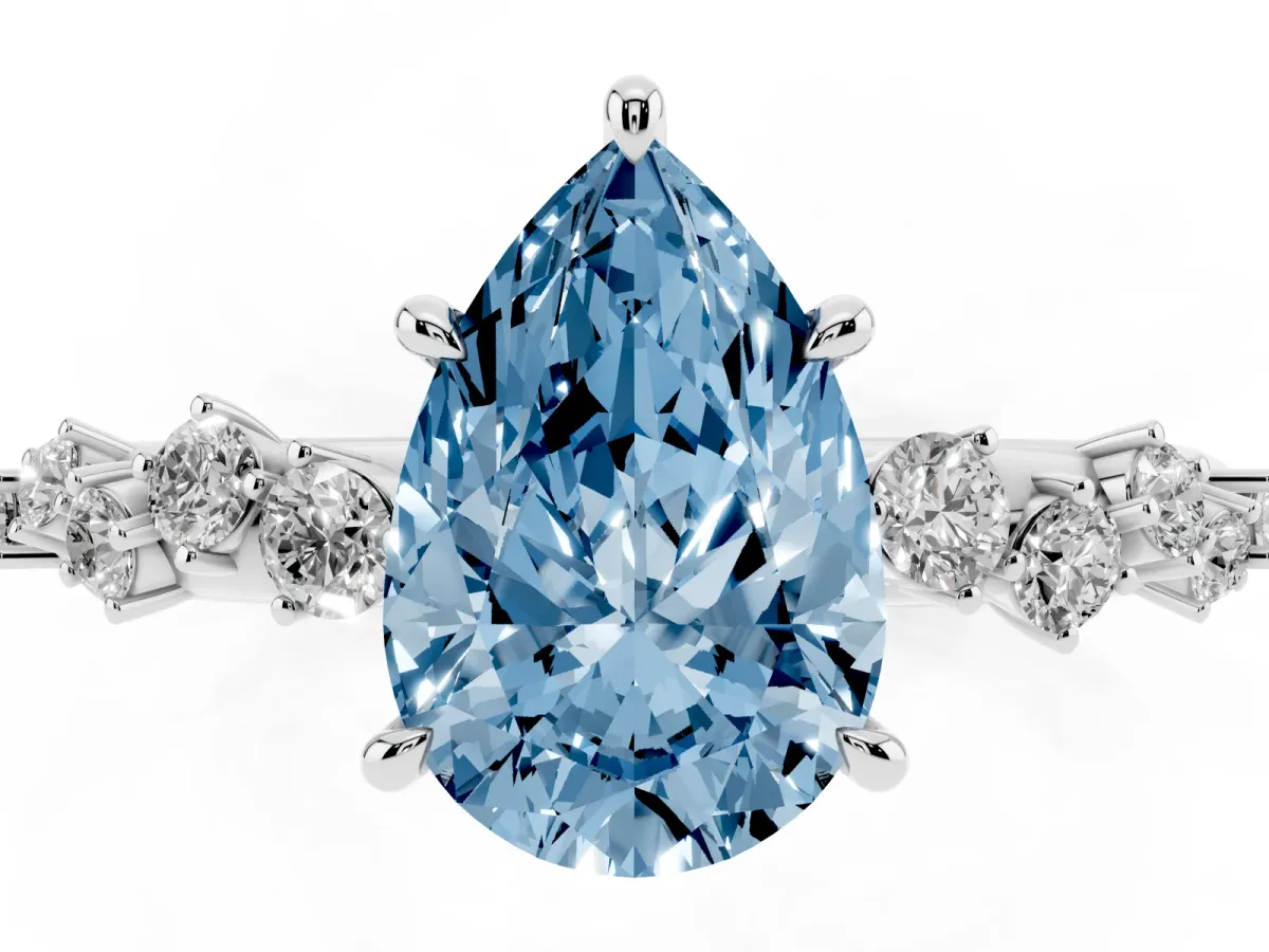 Fancy Blue Pear Cut Diamond Cluster Side Stone Solitaire Ring with Prong Setting Silver