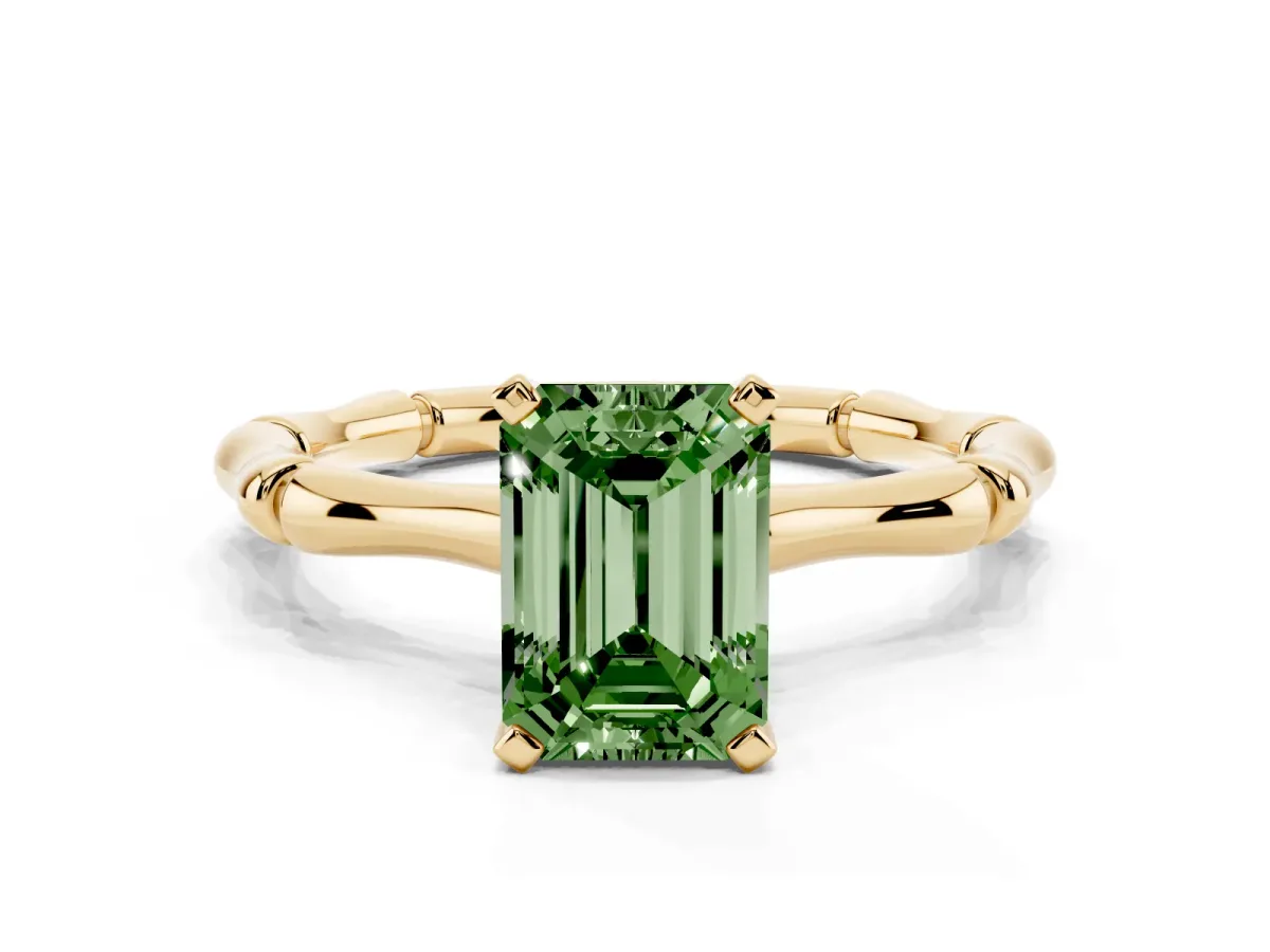 Fancy Green Emerald Cut Solitaire Diamond Ring with Bamboo Band and Four-Prong Setting Yellow gold