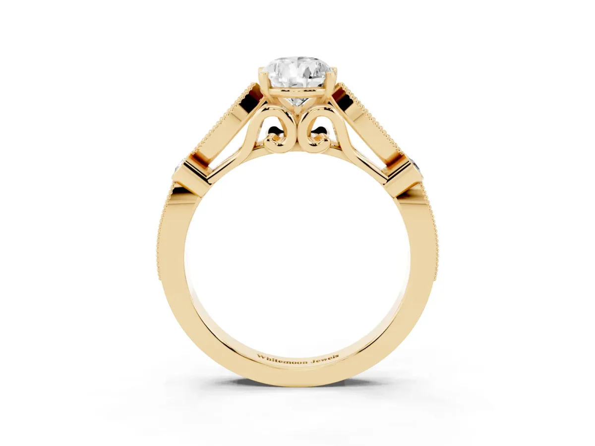 Pear Cut Cut Diamond with Milgrain Marquise and Bezel Accents on a Solitaire Band with Prong Setting Yellow gold