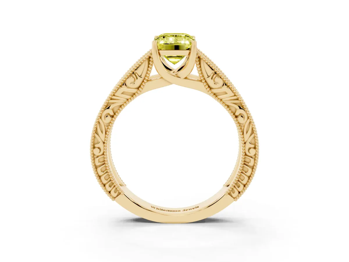 Fancy Yellow Emerald Cut Diamond Solitaire Ring with Engraved Band and Four-Prong Setting Yellow gold