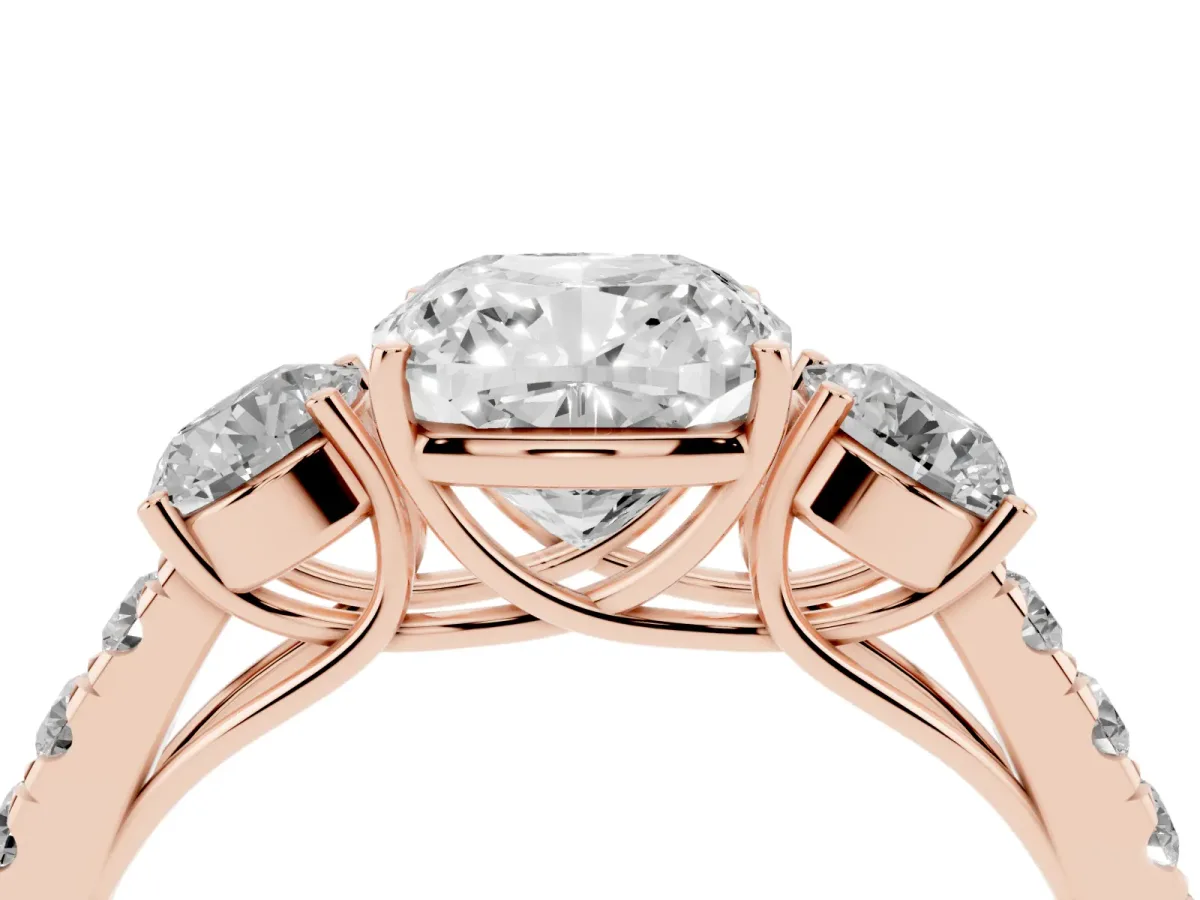 Cushion Cut Cut Diamond Three-Stone Ring with Round Side Stones and Pavé Band Rose gold