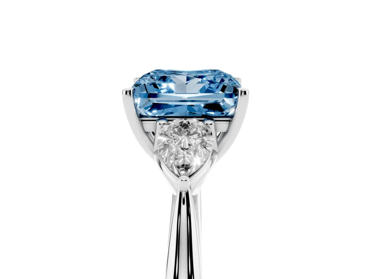 Fancy Blue Three-Stone Princess Cut Diamond Ring with Pear Side Stones in Four-Prong Setting Silver