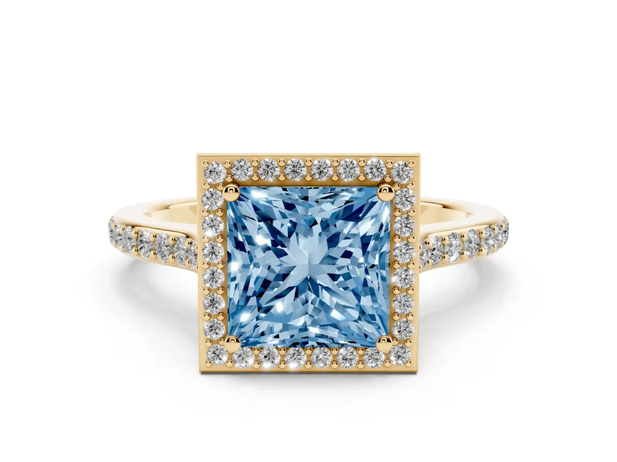 Fancy Blue Princess Cut Diamond Halo Engagement Ring with Round Pavé Shoulders and Prong Setting Yellow gold