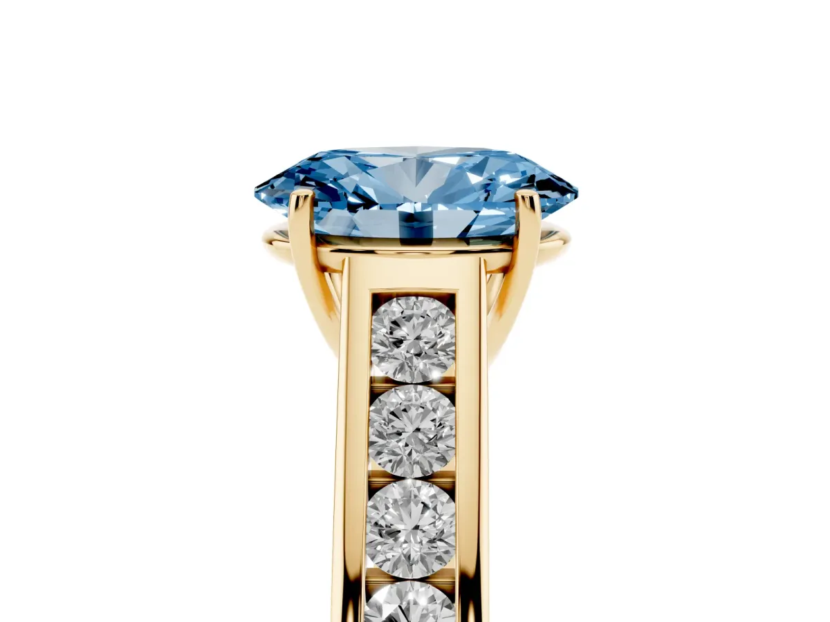 Fancy Blue Oval Cut Brilliant Channel-Set Solitaire Ring with Four-Prong Setting Yellow gold