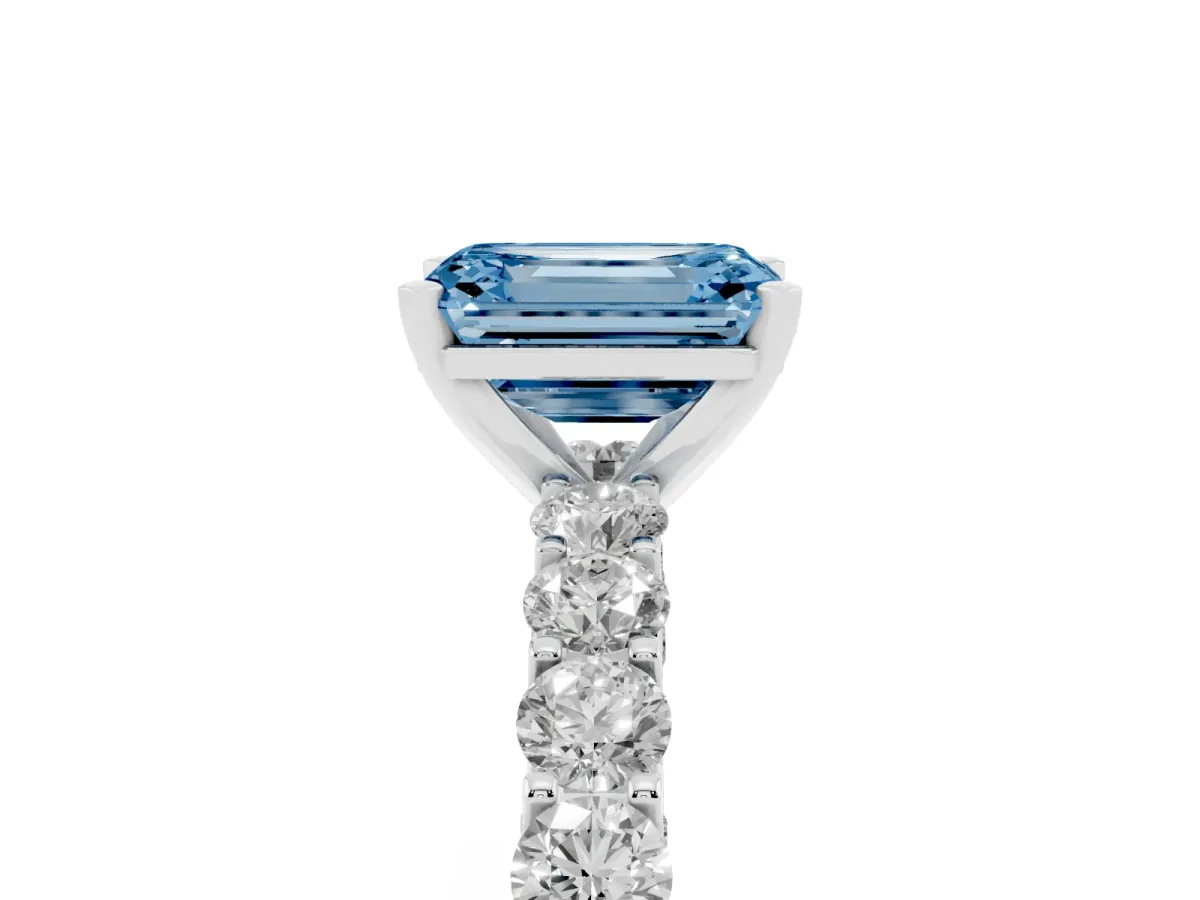 Fancy Blue Emerald Cut Diamond Solitaire Ring with Shared Prong Pavé Band and Four-Prong Setting Silver
