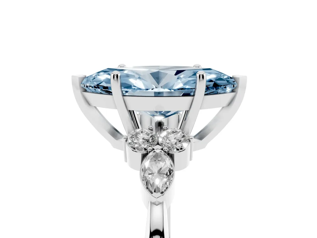 Fancy Blue Marquise Cut Brilliant Diamond Solitaire Ring with Pear Side Stones and Four-Prong Setting Silver