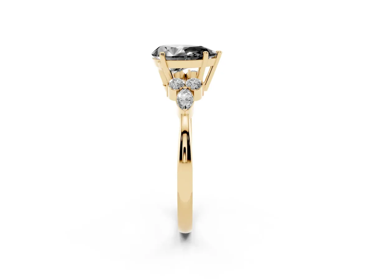 Fancy Black Pear Cut Brilliant Diamond Solitaire Ring with Pear Side Stones and Four-Prong Setting Yellow gold