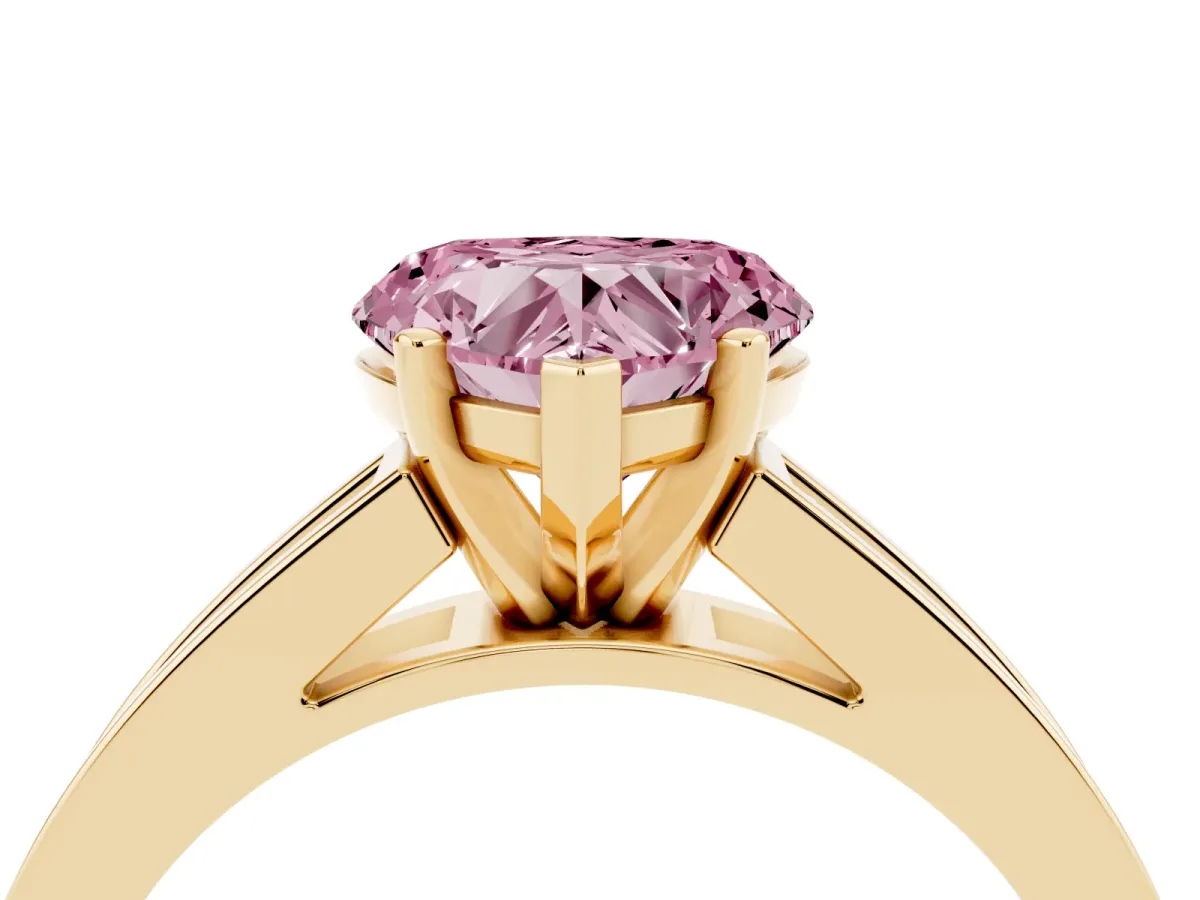 Fancy Pink Heart Cut Solitaire Diamond Ring with Channel-Set Band and Four-Prong Setting Yellow gold