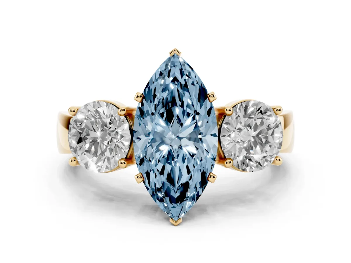 Fancy Blue Three-Stone Marquise Cut Diamond Ring with Round Side Stones, Classic Band, and Four-Prong Setting Yellow gold