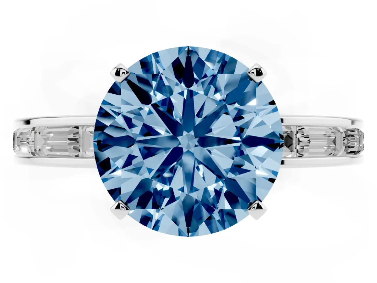 Fancy Blue Round Cut Solitaire Diamond Ring with Channel-Set Baguette Band and Four-Prong Setting White gold