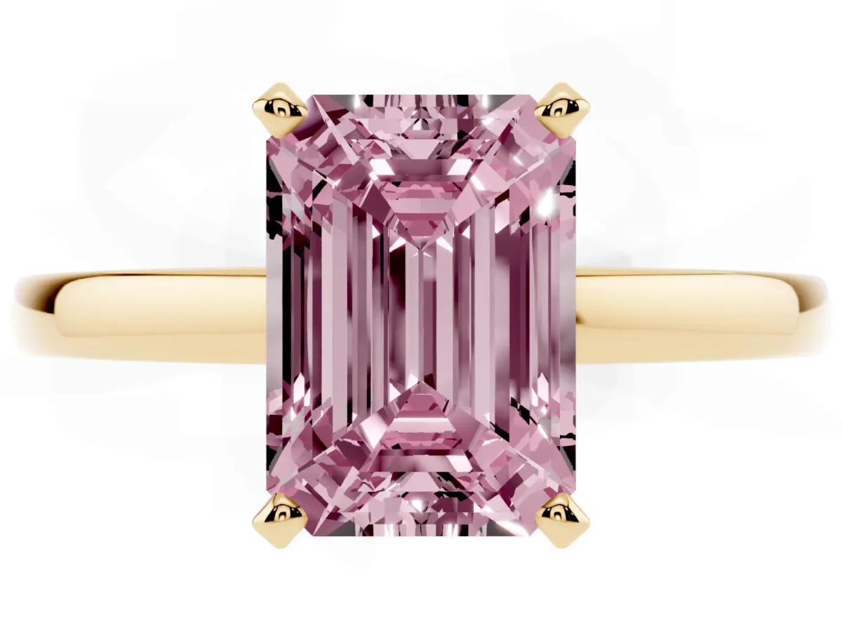 Fancy Pink Emerald Cut Solitaire Diamond Engagement Ring with Four-Prong Setting on a Classic Band Yellow gold