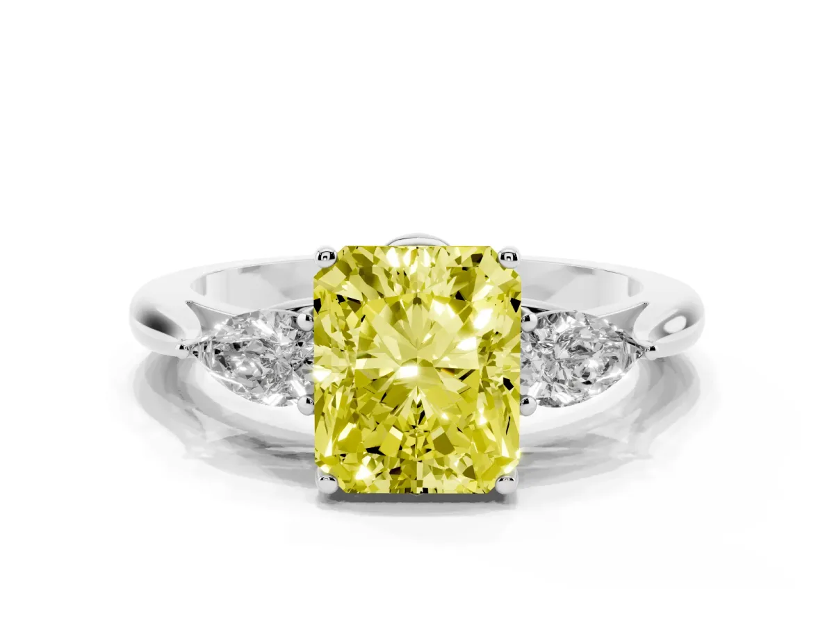 Fancy Yellow Three-Stone Radiant Cut Diamond Ring with Pear Side Stones in Four-Prong Setting Silver