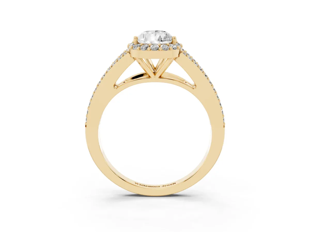 Pear Cut Halo Split Shank Diamond Ring with Prong Setting Yellow gold