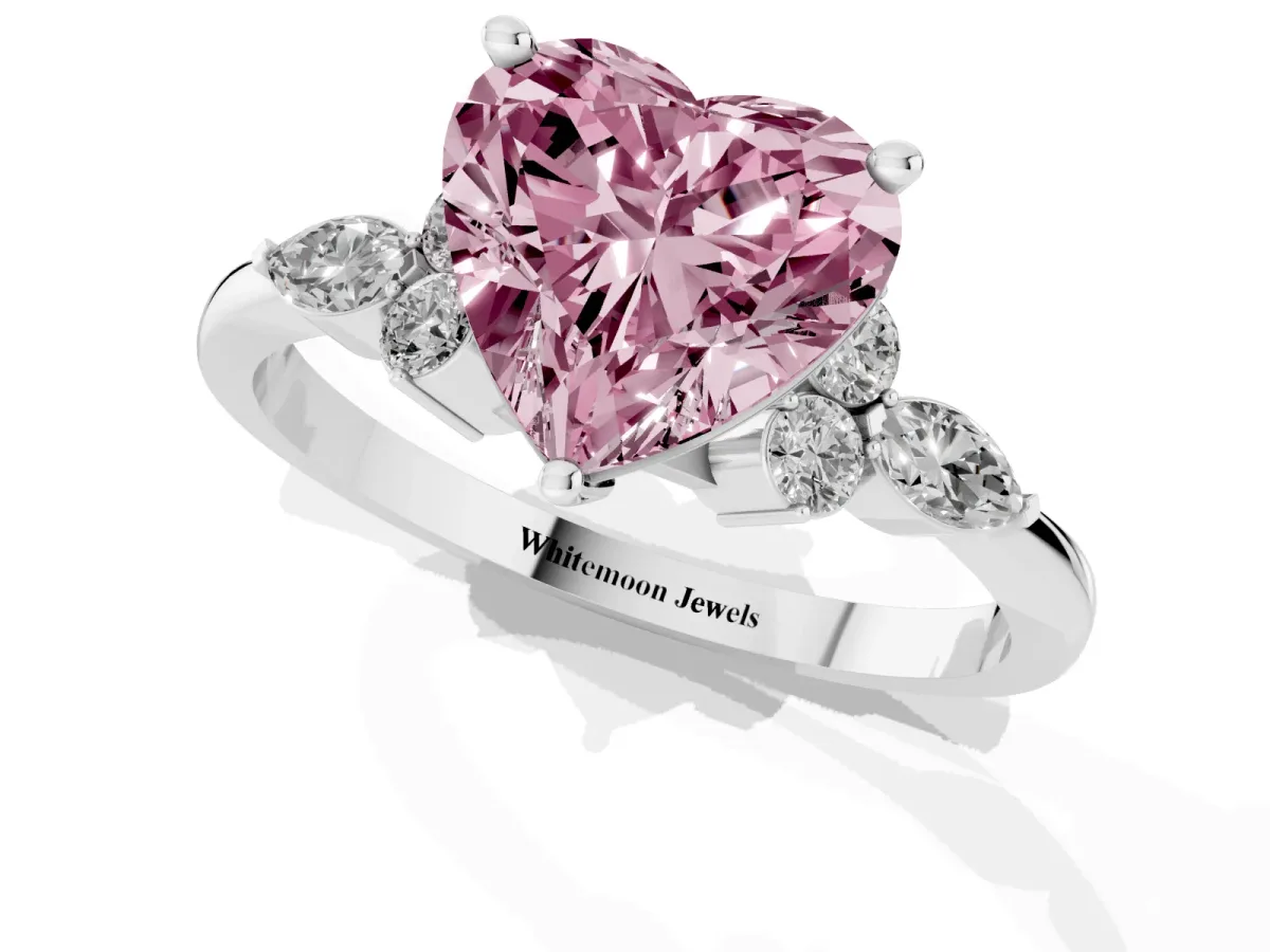 Fancy Pink Heart Cut Brilliant Diamond Solitaire Ring with Pear Side Stones and Four-Prong Setting Platinum