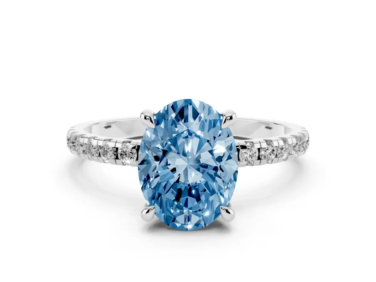 Fancy Blue Oval Cut Diamond Brilliant Solitaire Ring with Pavé Band and Four-Prong Setting Platinum