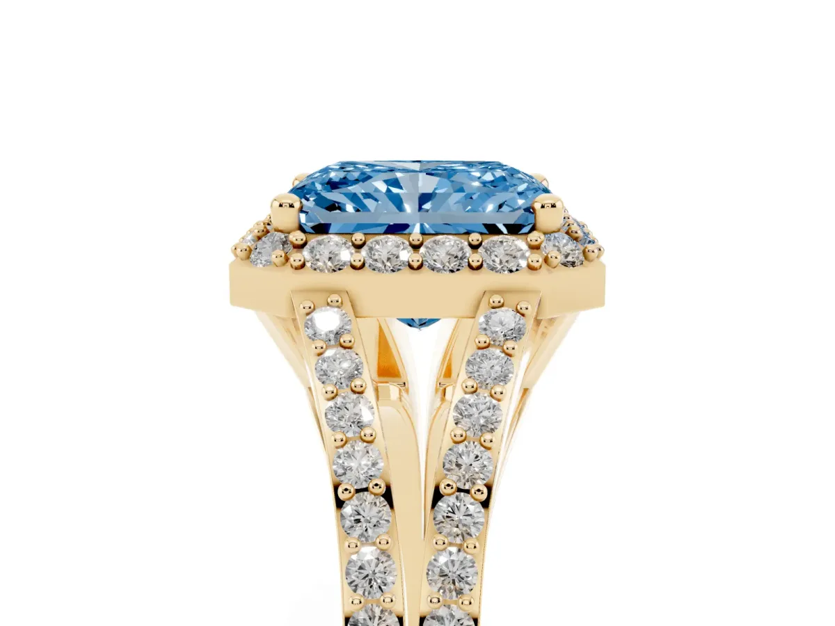 Fancy Blue Radiant Cut Halo Split Shank Pave Diamond Ring with Four-Prong Setting Yellow gold