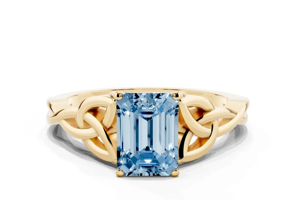 Fancy Blue Emerald Cut Diamond Solitaire Engagement Ring with Celtic Knot Band and Four-Prong Setting Yellow gold