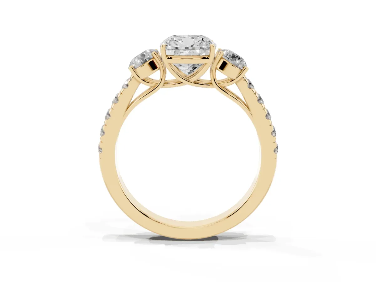 Cushion Cut Cut Diamond Three-Stone Ring with Round Side Stones and Pavé Band Yellow gold