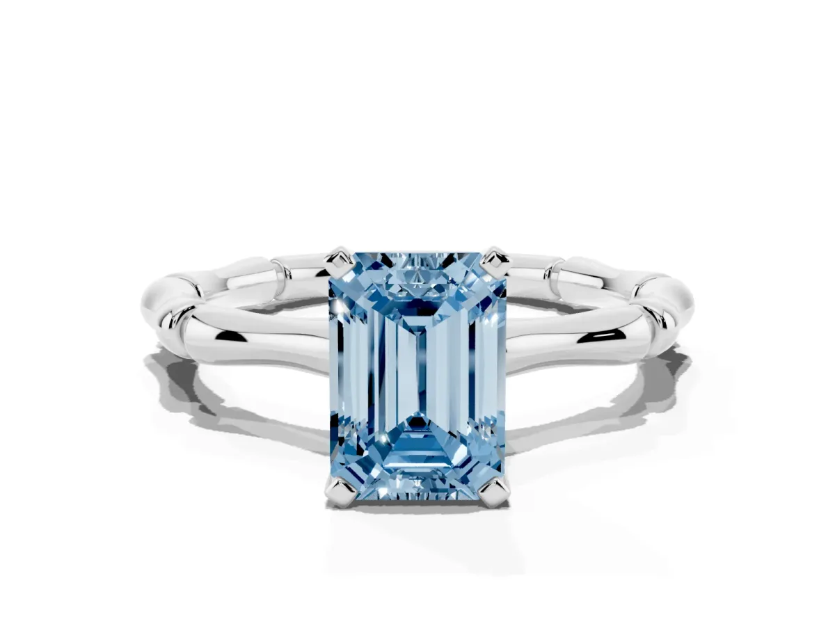 Fancy Blue Emerald Cut Solitaire Diamond Ring with Bamboo Band and Four-Prong Setting Platinum