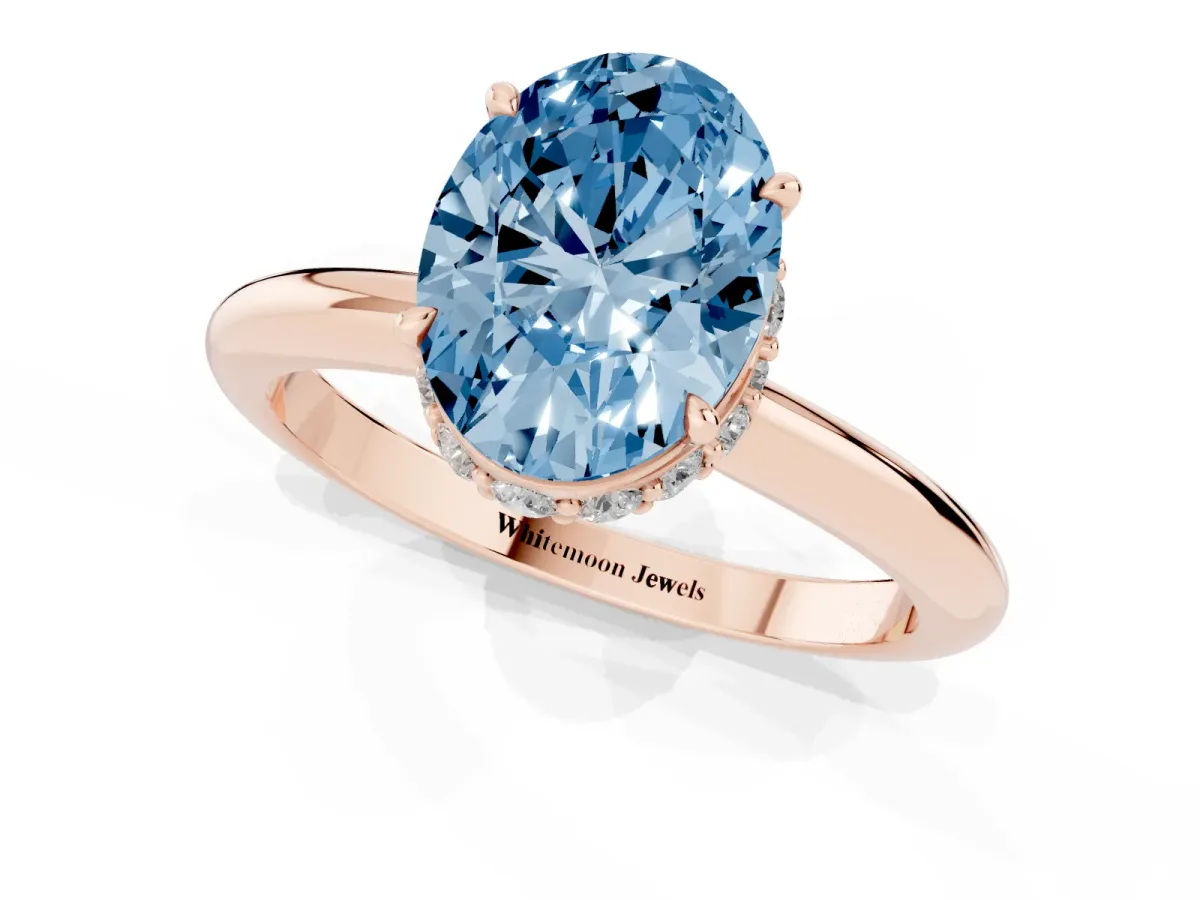 Fancy Blue Oval Cut Brilliant Solitaire Engagement Ring with Six-Prong Setting and Classic Band Rose gold