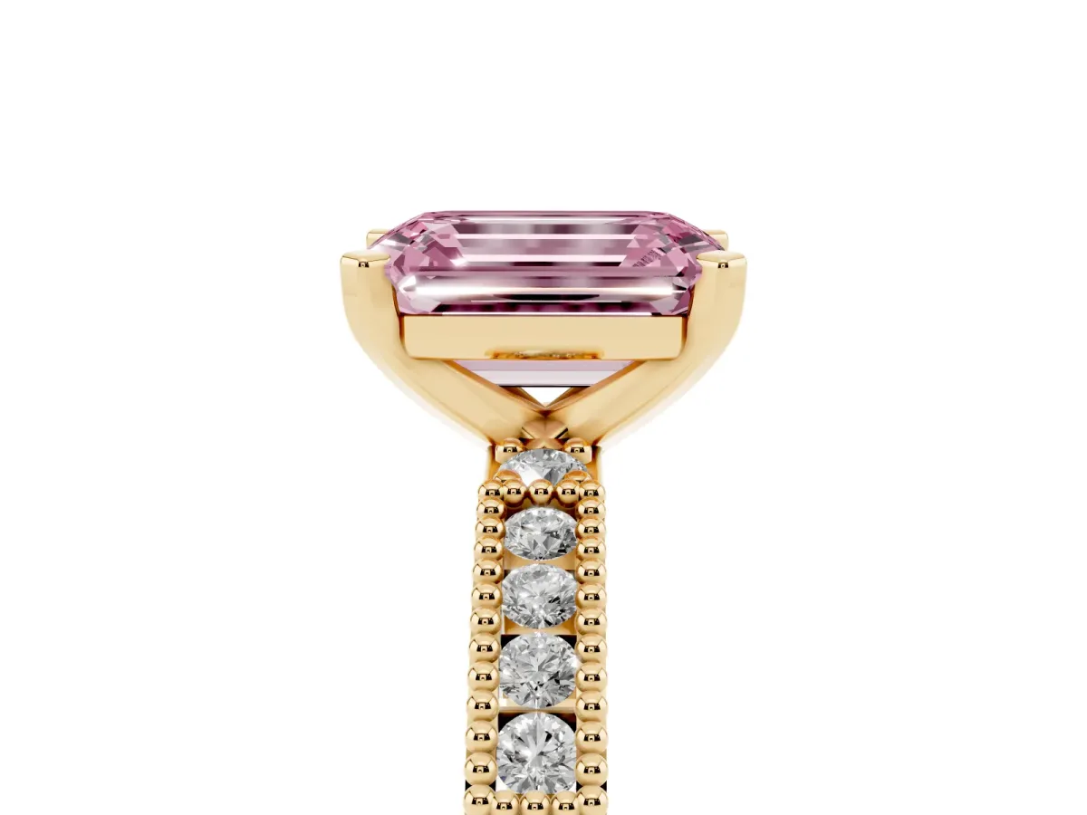 Fancy Pink Emerald Cut Solitaire with Pavé Band and Four-Prong Setting Yellow gold
