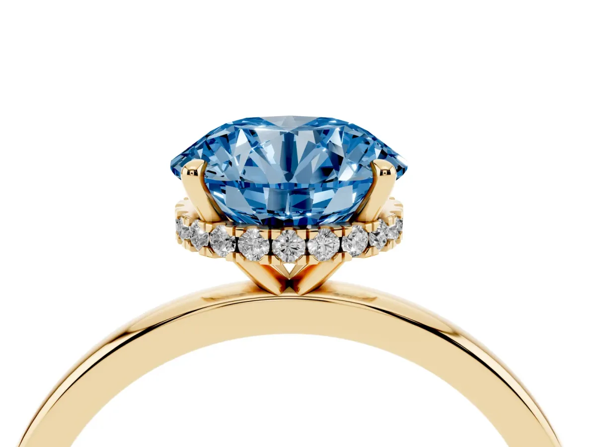 Fancy Blue Round Cut Solitaire Engagement Ring with Cathedral Band and Four-Prong Setting Yellow gold